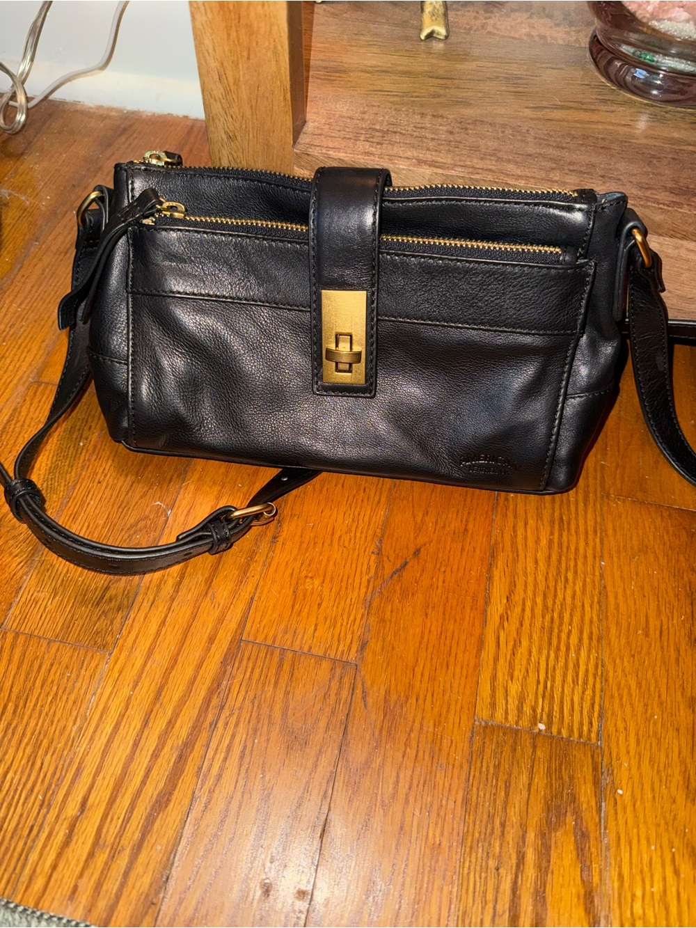Classic Black Leather Crossbody Bag with Gold Accent